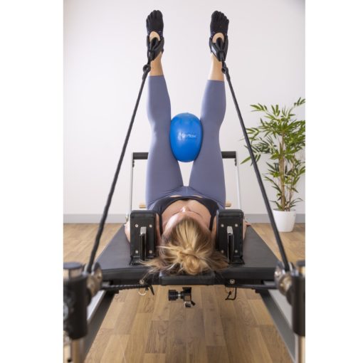 Exercice de Pilates avec le Reformer A8 Rehab